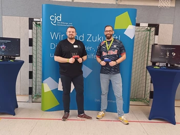 Zwei CJD-Kollegen beim Fachtag Berufliche Bildung und Rehabilitation 2025 im CJD BBW Gera